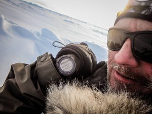 Picture taken by Mark Wood of Vic Vicary marking the Pole with his watch