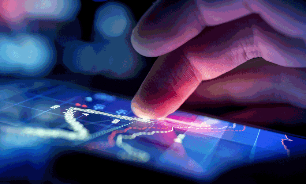 A close-up photo of fingers on a touchscreen device with numerous dots and lines connecting at the fingertips.