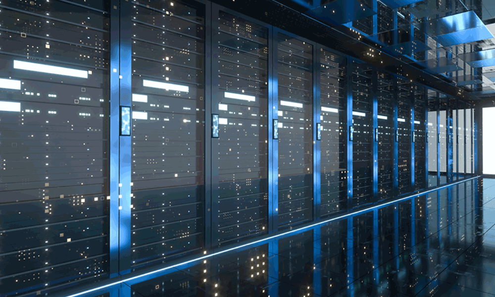 A photo of numerous black computer servers within transparent cupboards in a data center.